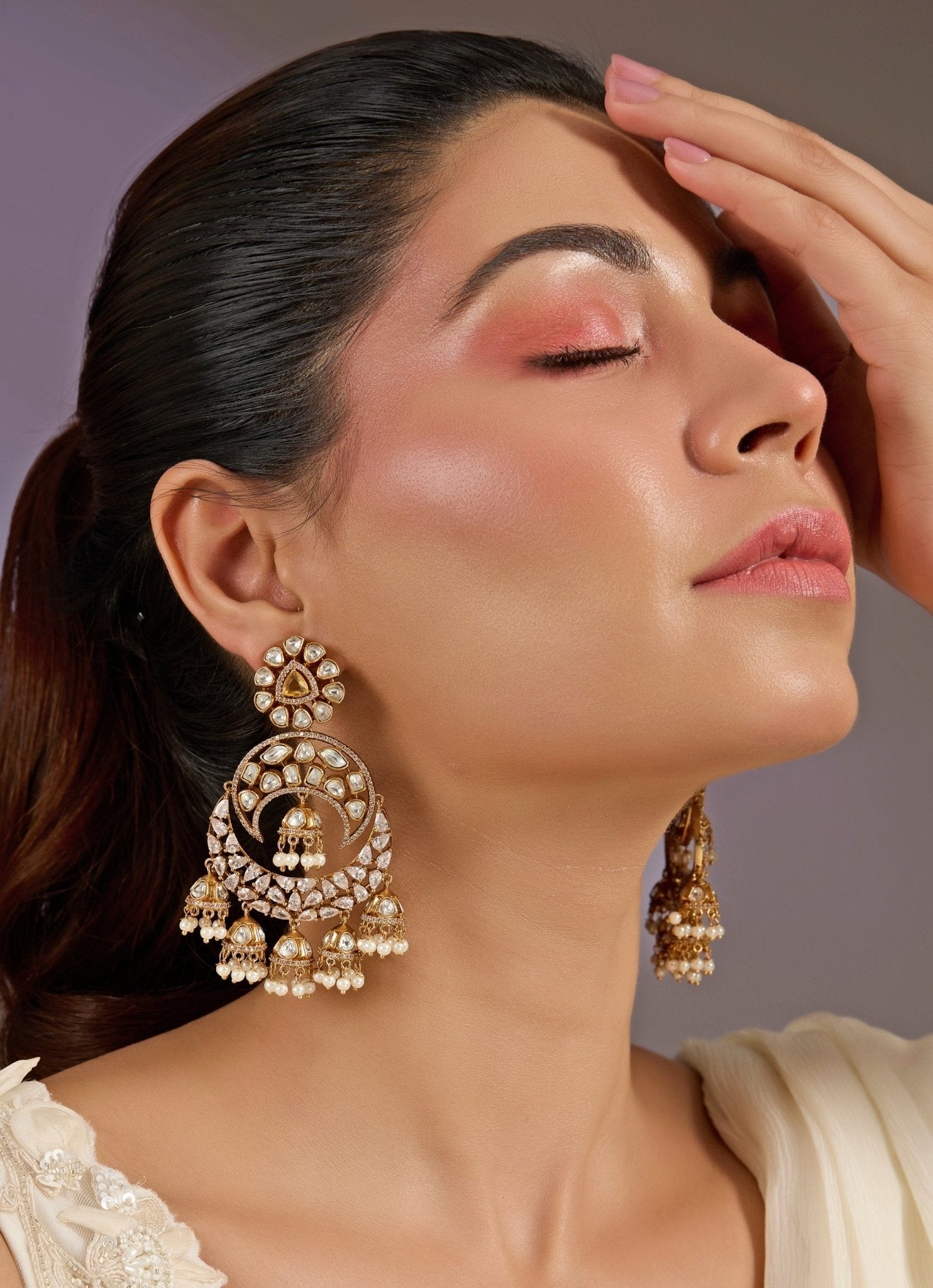 Vivinia by Vidhi Mehra Antique Gold Plated Statement Jhumka EarringsFabilicious Fashion