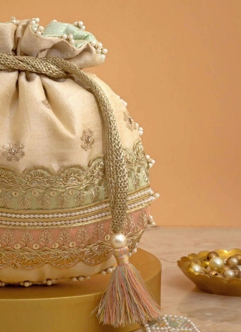 Amyra Beige Silk Potli With Mint Green And Pink WorkShop Jashn
