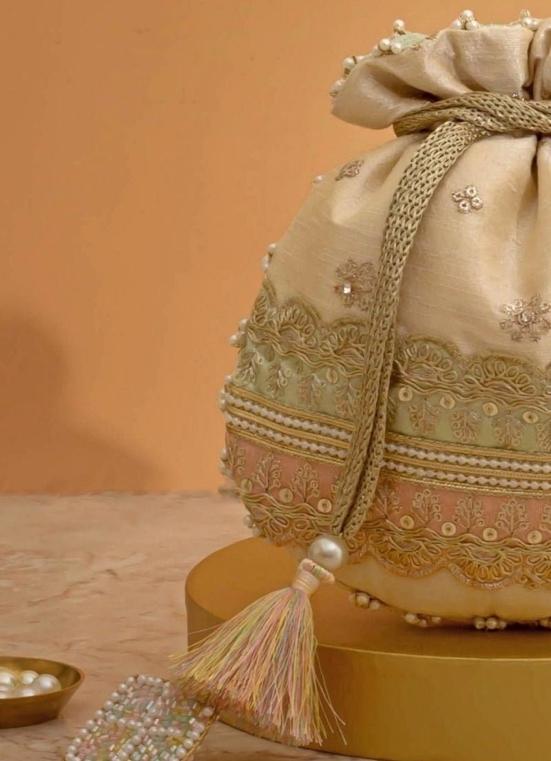 Amyra Beige Silk Potli With Mint Green And Pink WorkShop Jashn
