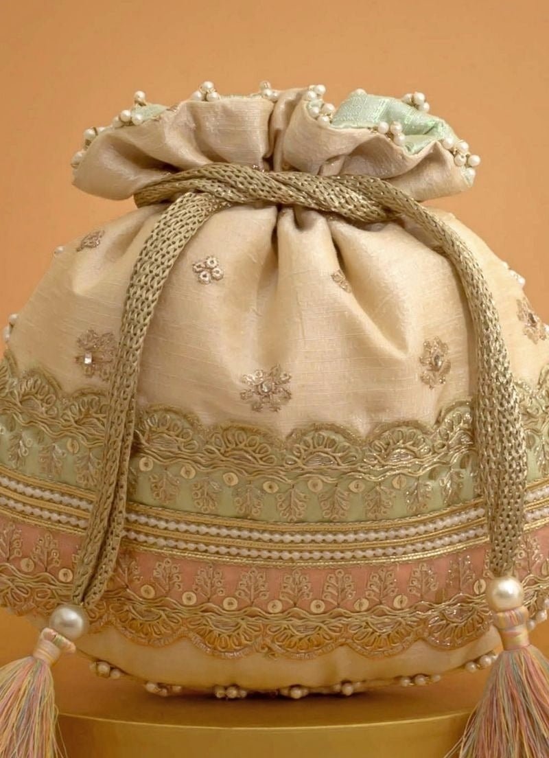 Amyra Beige Silk Potli With Mint Green And Pink WorkShop Jashn