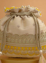 Amyra Beige Silk Potli With Mint Green And Yellow WorkShop Jashn