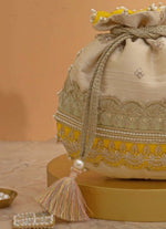 Amyra Beige Silk Potli With Mint Green And Yellow WorkShop Jashn