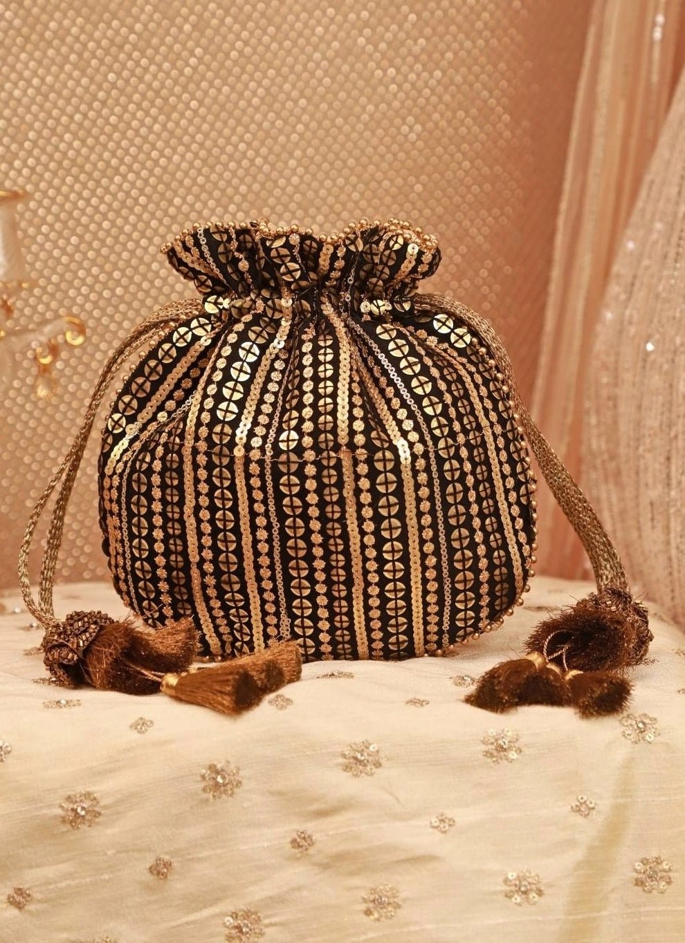 Amyra Black And Gold Soft Net PotliShop Jashn