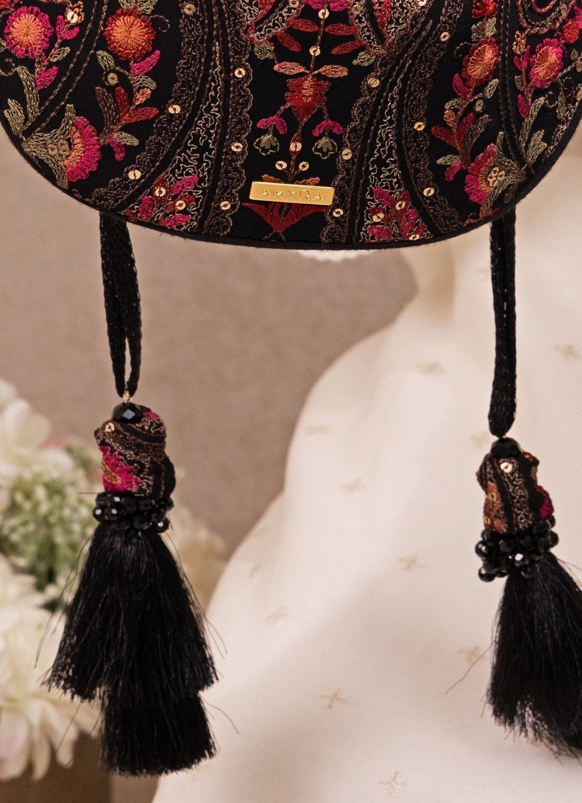 Amyra Black Embroidered Georgette Round PotliShop Jashn