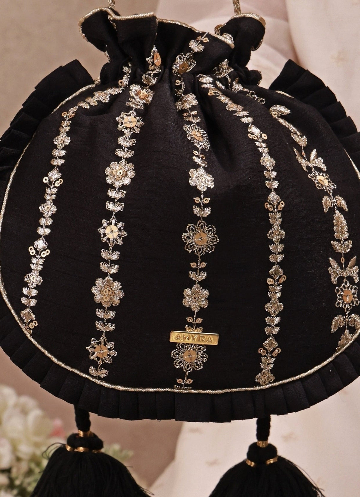 Amyra Black Embroidered Silk Pleated PotliShop Jashn