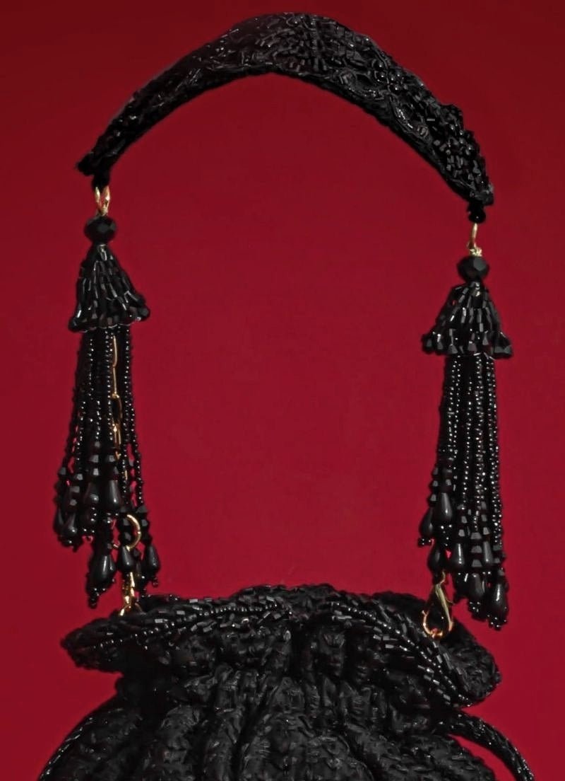 Amyra Black Embroidered Silk PotliShop Jashn