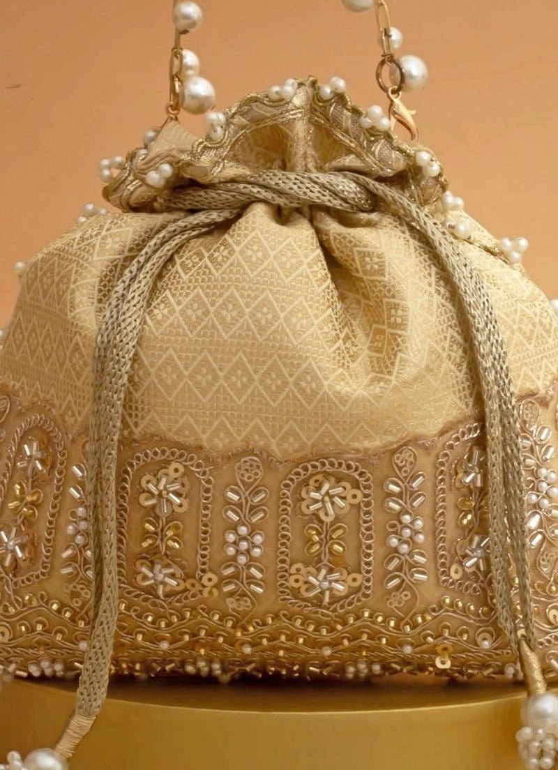Amyra Cream Silk Embroidered PotliShop Jashn