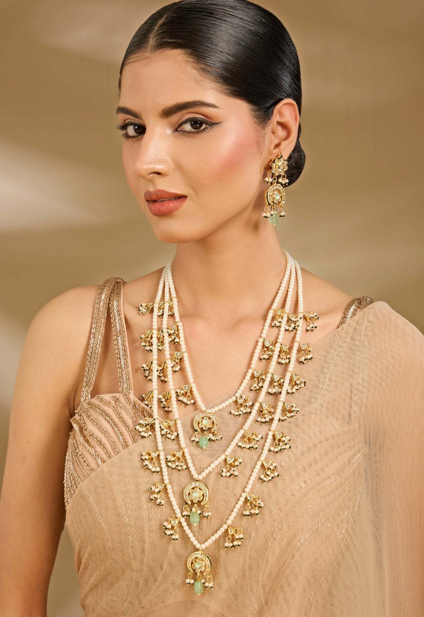 Vivinia by Vidhi Mehra Gold Toned Green Layered Pearl Necklace SetFabilicious Fashion