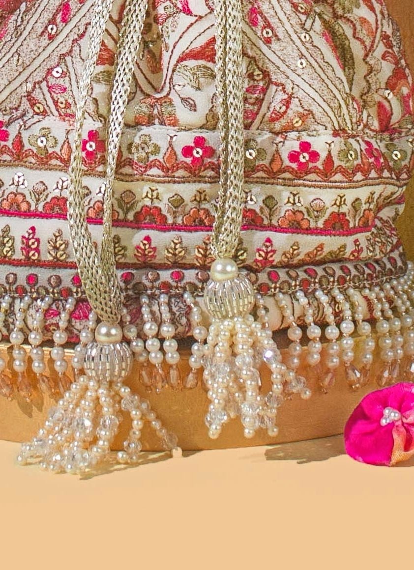 Amyra Ivory Embroidered Georgette PotliShop Jashn