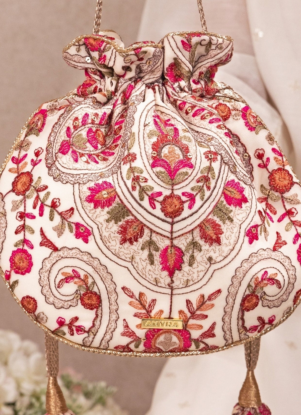 Amyra Ivory Embroidered Georgette Round PotliShop Jashn