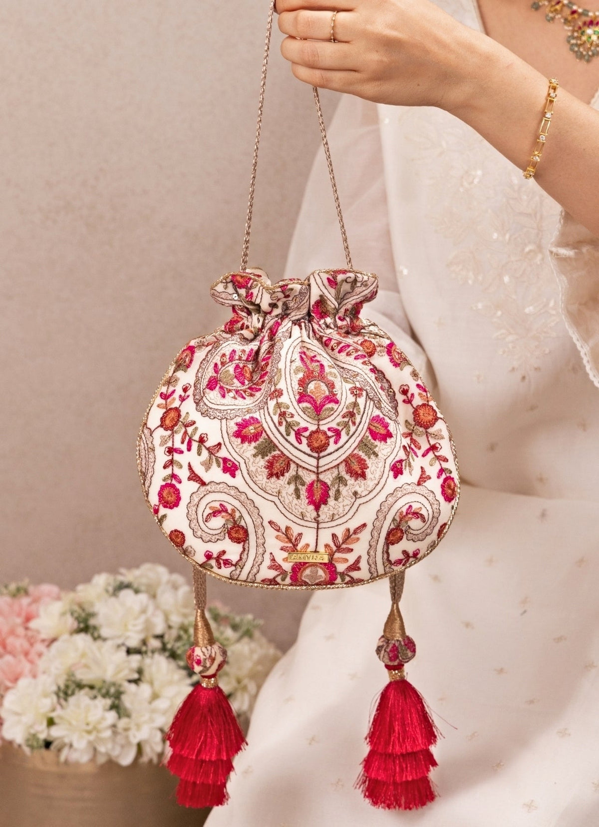 Amyra Ivory Embroidered Georgette Round PotliShop Jashn