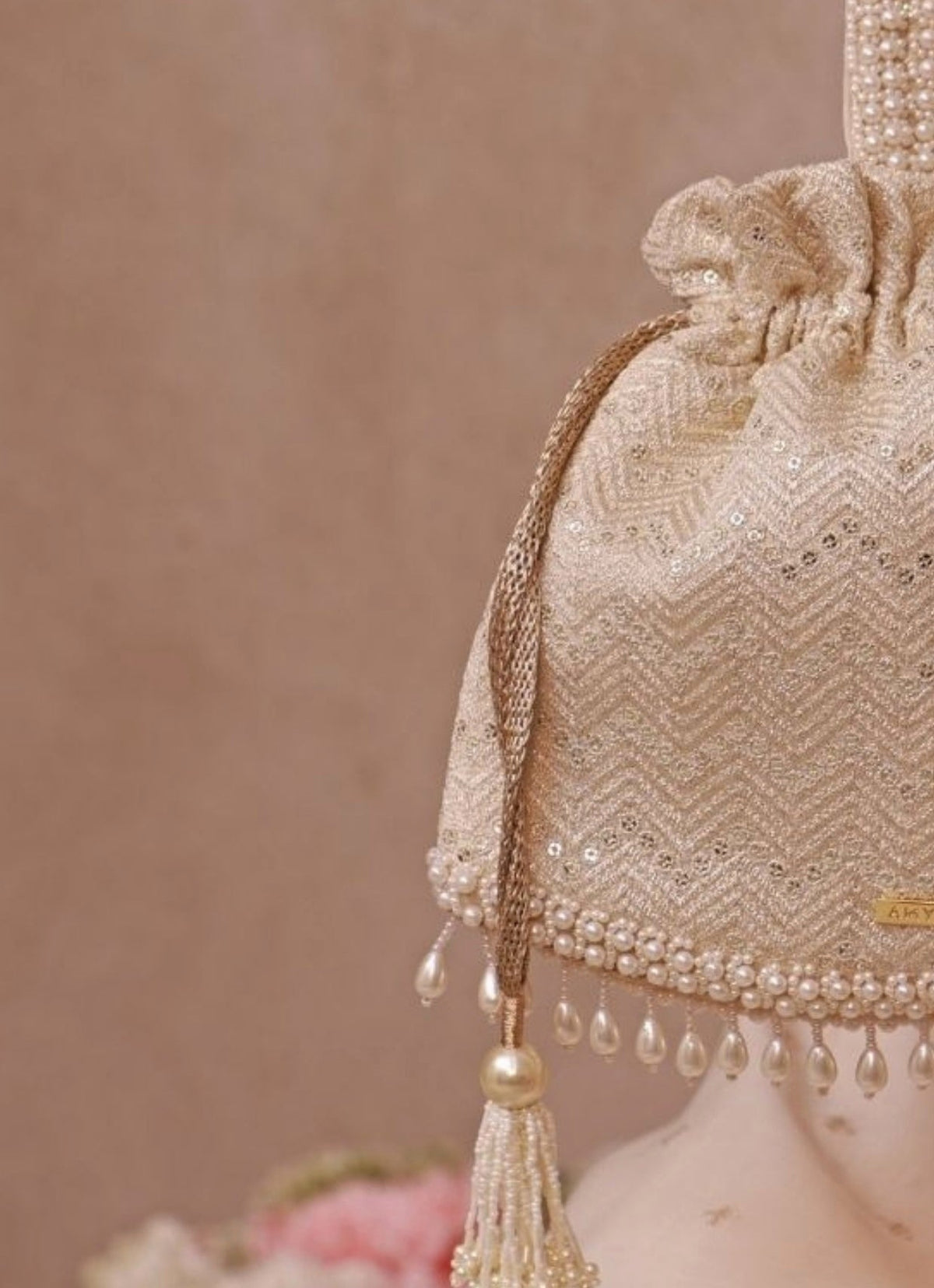 Amyra Ivory Embroidered PotliShop Jashn