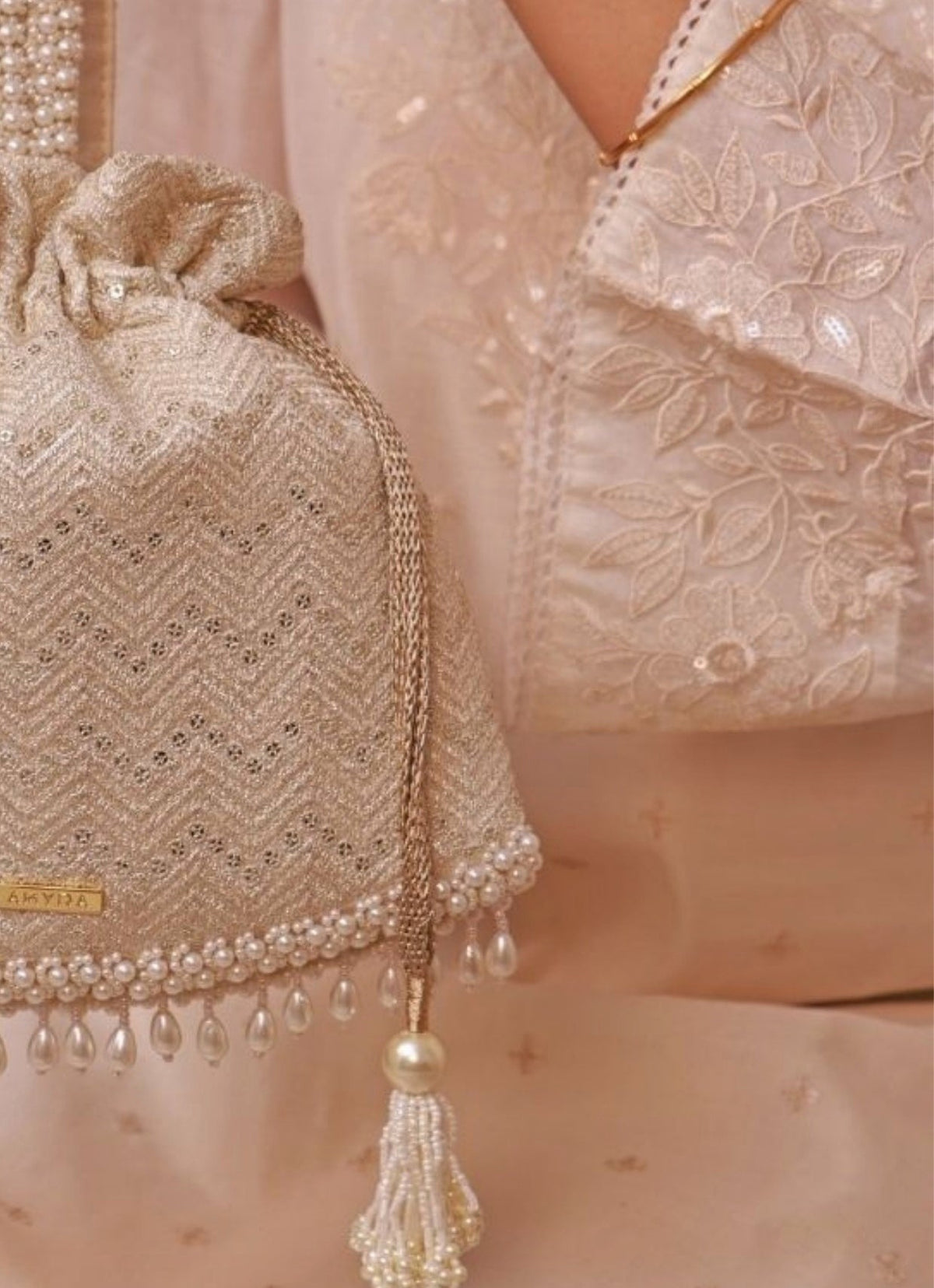 Amyra Ivory Embroidered PotliShop Jashn