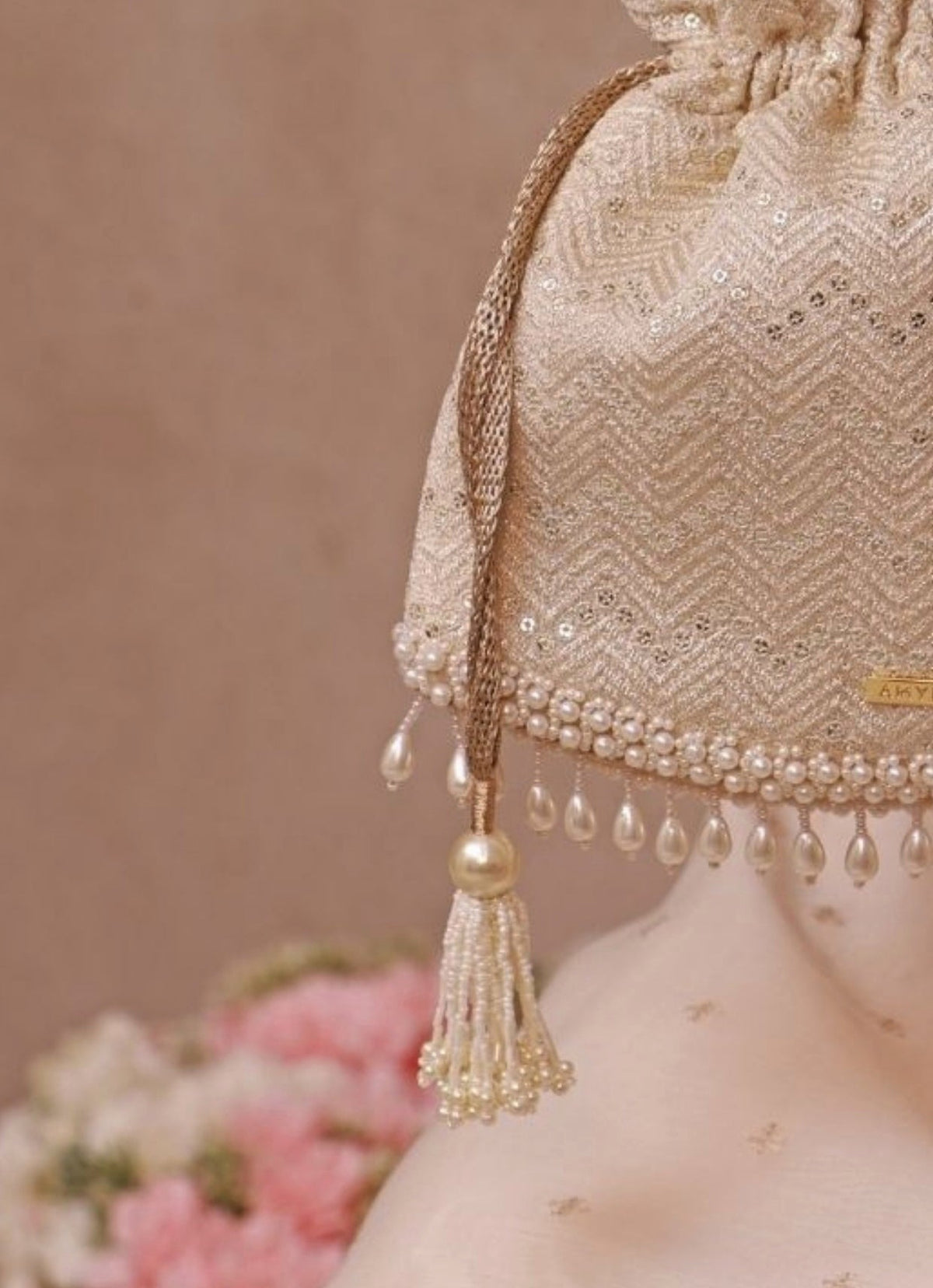 Amyra Ivory Embroidered PotliShop Jashn