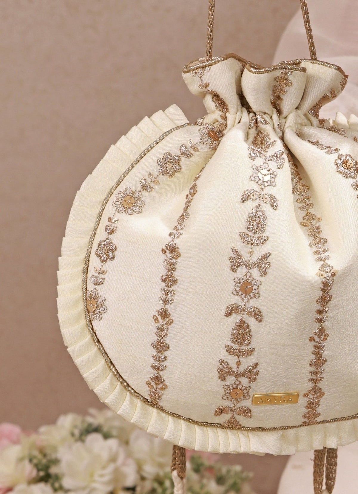 Amyra Ivory Embroidered Silk Pleated PotliShop Jashn