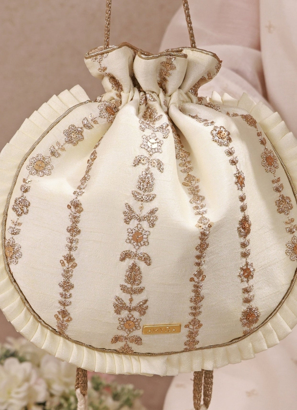Amyra Ivory Embroidered Silk Pleated PotliShop Jashn
