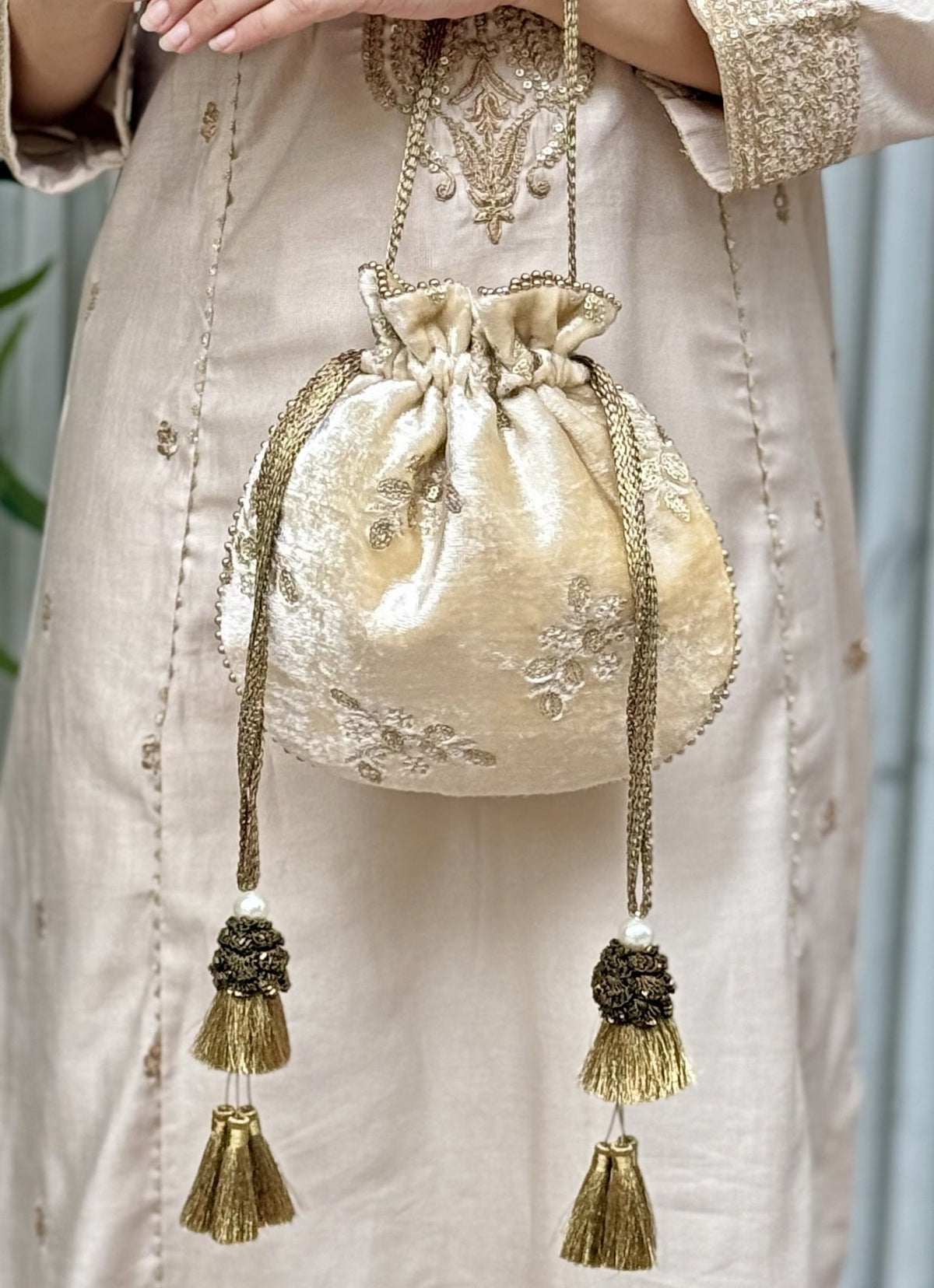 Amyra Ivory Embroidered Velvet PotliShop Jashn
