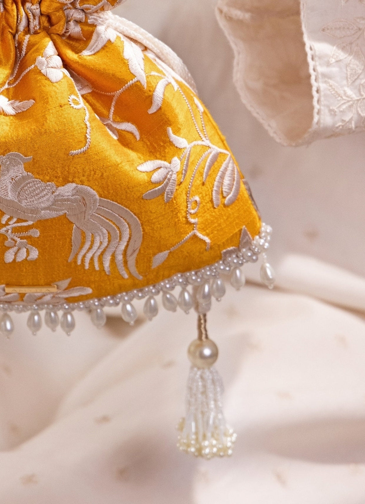 Amyra Mustard Yellow Embroidered Silk Top Handle PotliShop Jashn