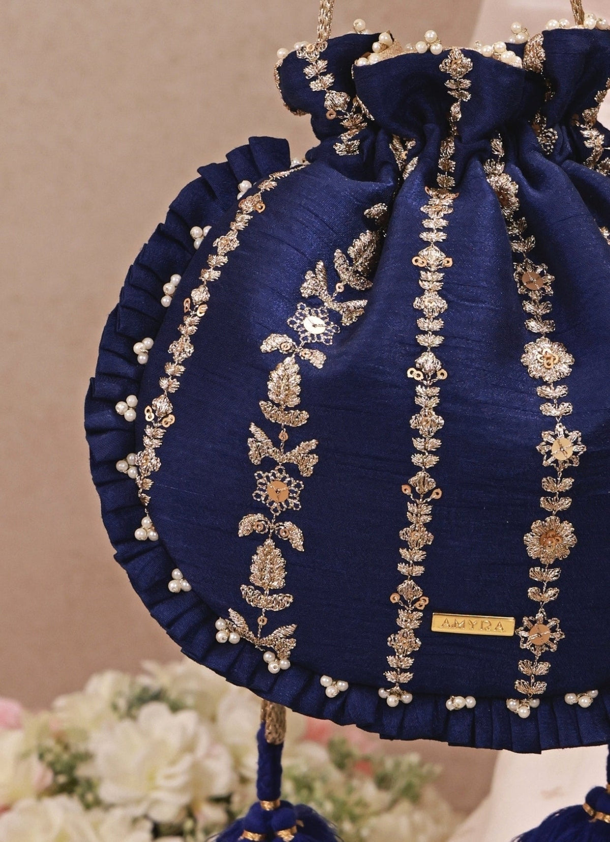 Amyra Navy Blue Embroidered Silk Pleated PotliShop Jashn