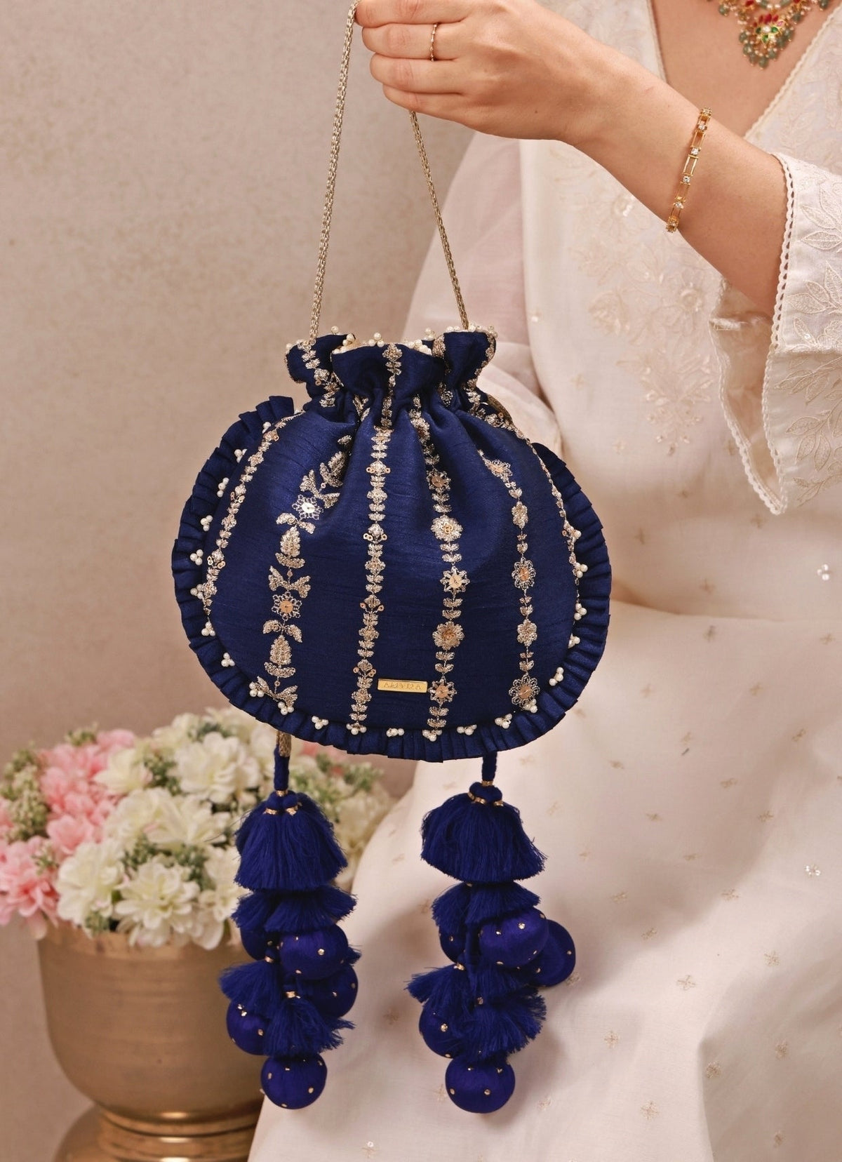 Amyra Navy Blue Embroidered Silk Pleated PotliShop Jashn