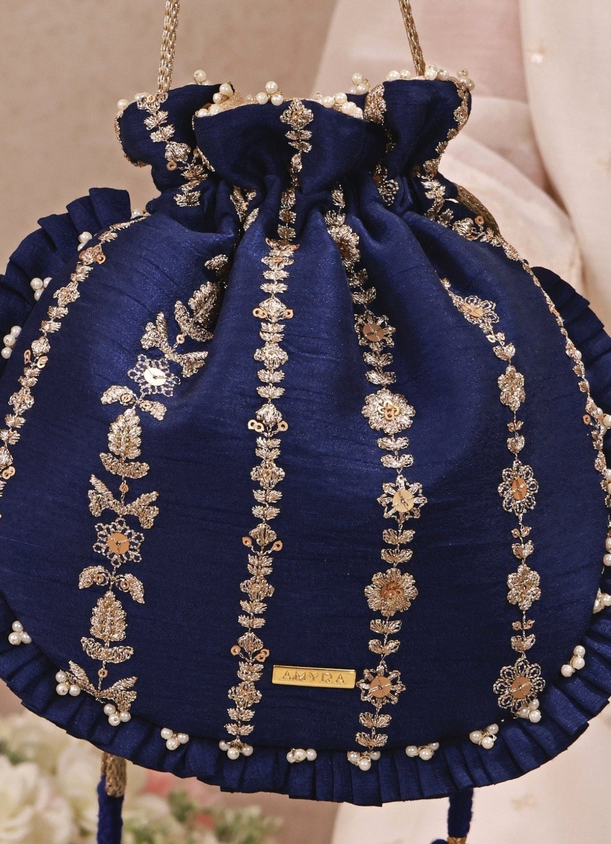 Amyra Navy Blue Embroidered Silk Pleated PotliShop Jashn