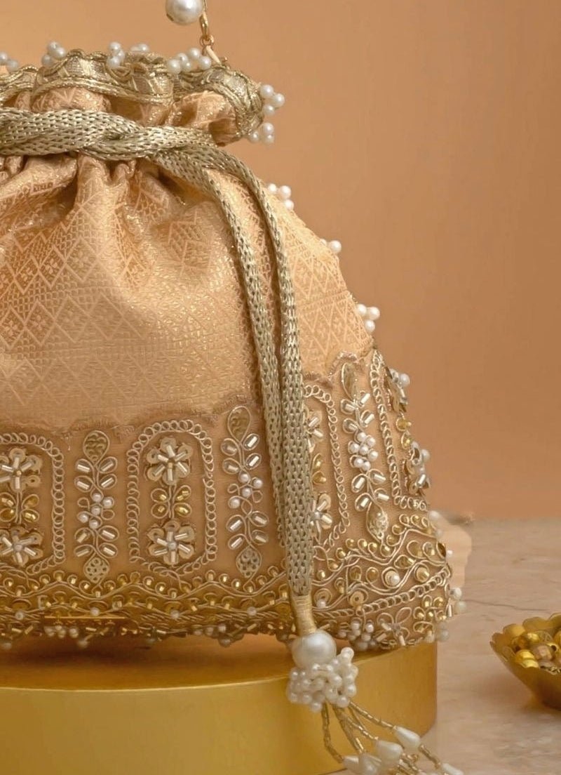 Amyra Peach Silk Embroidered PotliShop Jashn