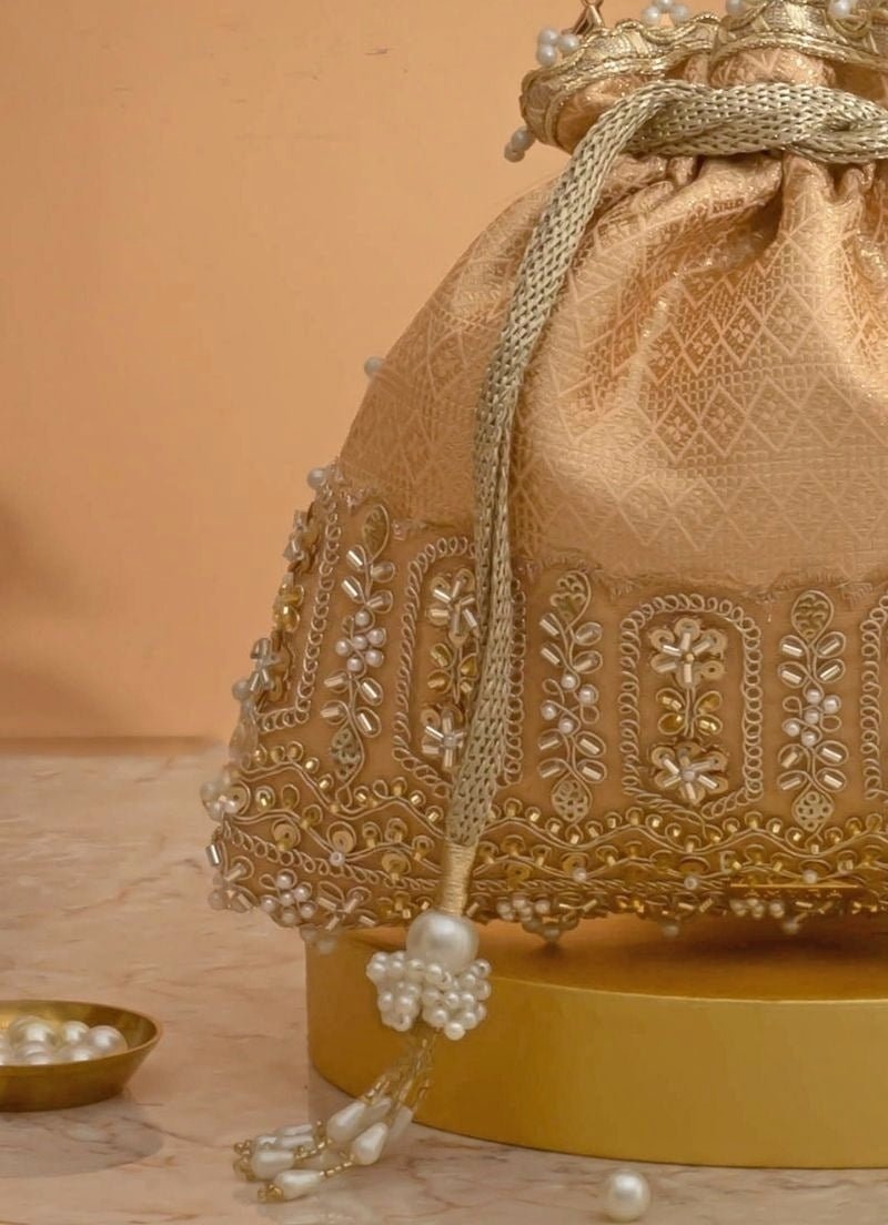 Amyra Peach Silk Embroidered PotliShop Jashn