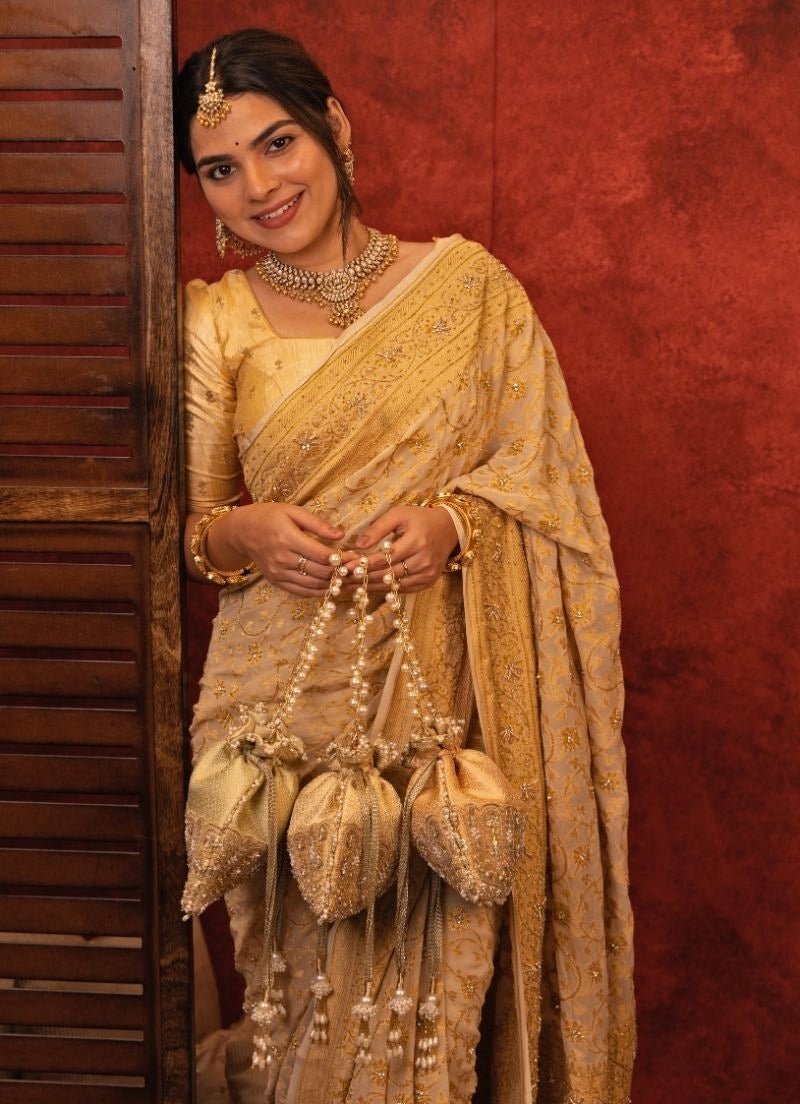 Amyra Peach Silk Embroidered PotliShop Jashn