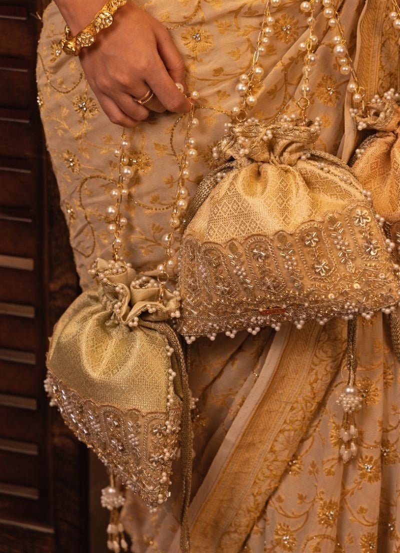 Amyra Peach Silk Embroidered PotliShop Jashn