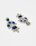 Vivinia by Vidhi Mehra Silver Plated Blue Stone And Zircon Dangler EarringsFabilicious Fashion